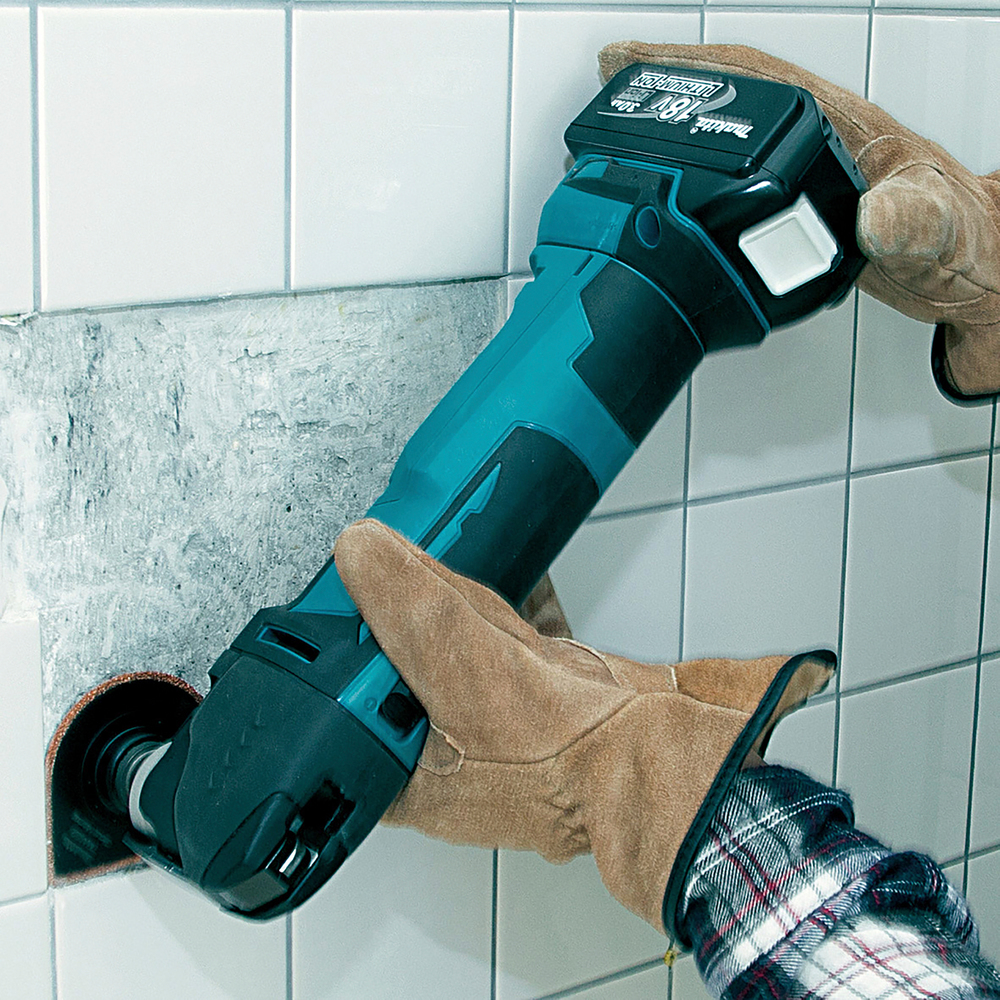 Monitoimikone Makita DTM51Z 18V, 6000-21000 liikettä/min, liike 3,2°. Runkoversio